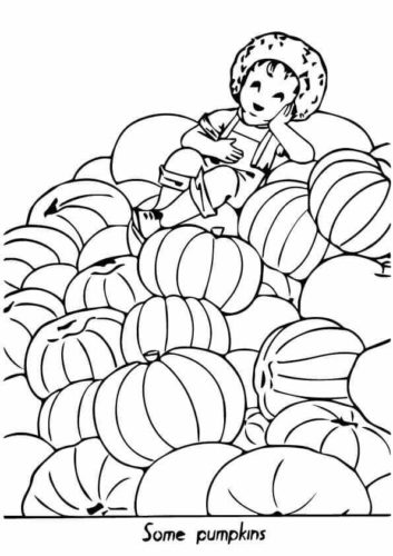 Boy Resting On A Stack Of Pumpkins