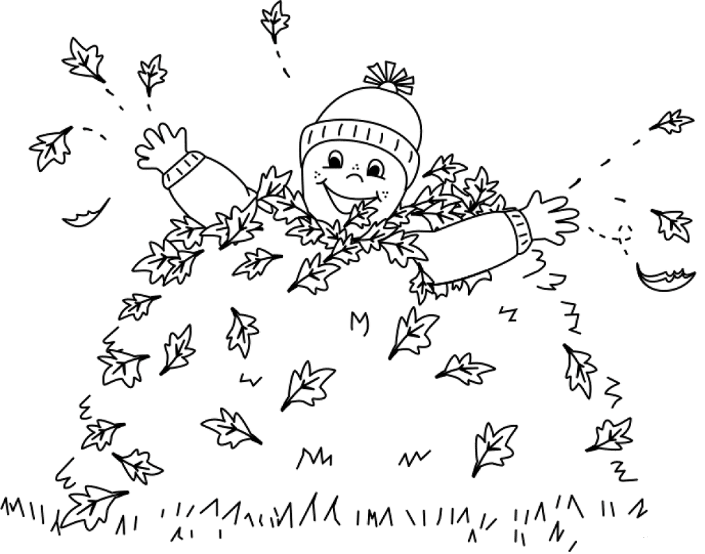 Boy jumping in leaves